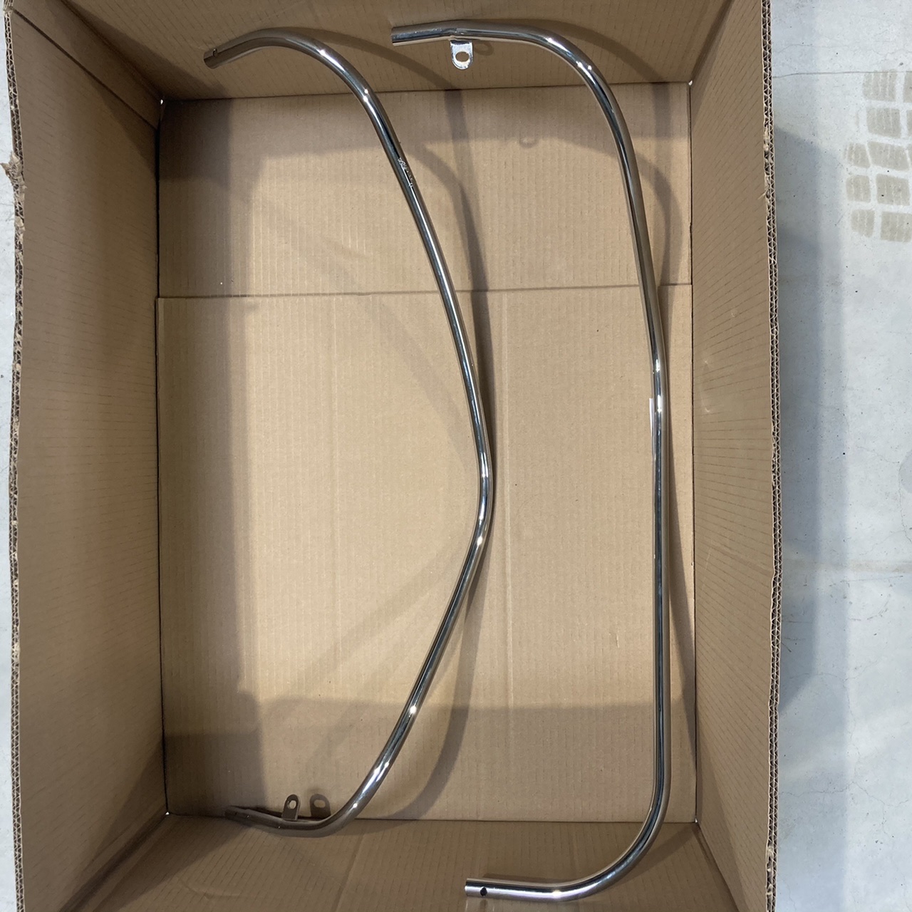 Support de pare-jambes d'origine Vespa chromé Vespa LX / LXV